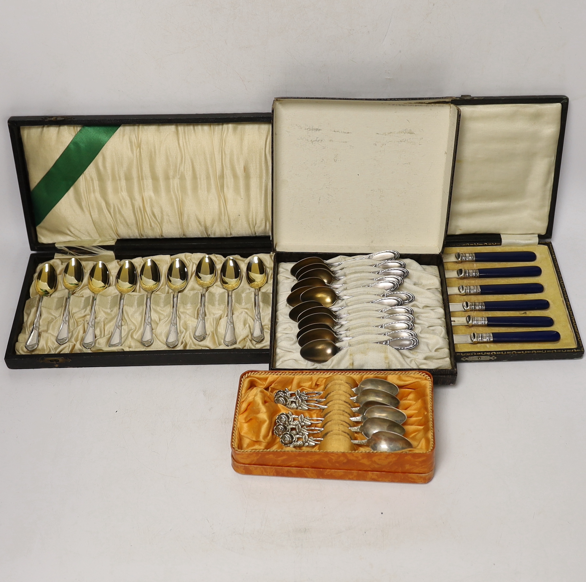 Four cased Continental cutlery sets, one 800 standard